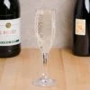 GET Enterprises GET SW-1401-1-SAN-CL 6 Oz. Customizable SAN Plastic Champagne Flute 2 GET Enterprises GET SW-1401-1-SAN-CL 6 Oz. Customizable SAN Plastic Champagne Flute -Acopa Shop 1692630