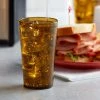 GET Enterprises GET 6612-1-A 12 Oz. Amber Customizable SAN Plastic Pebbled Tumbler - 72/Case 2 GET Enterprises GET 6612-1-A 12 Oz. Amber Customizable SAN Plastic Pebbled Tumbler - 72/Case -Acopa Shop 1856123